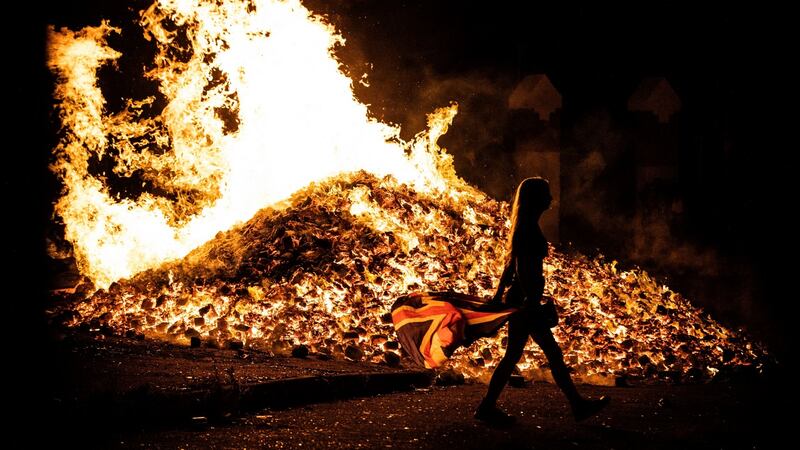 The Tiger’s Bay bonfire in Belfast alight in the early hours of Monday morning. Photograph: Liam McBurney/PA Wire