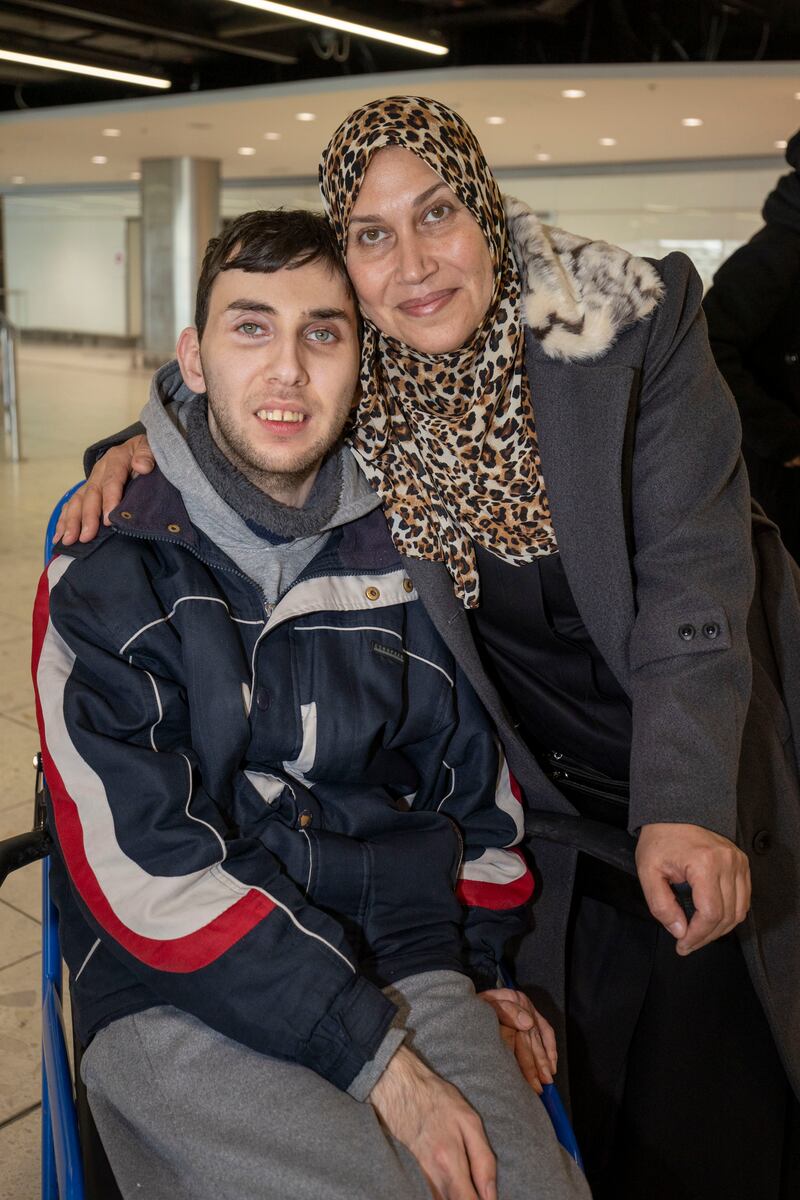 Hamza Hammad (centre) pictured with his Mother, Huda Hammad.
Photograph: Tom Honan for The Irish Times.