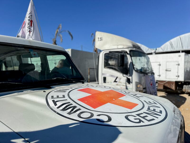 Red Crescent vehicles and refrigerated trucks are parked at the Nasser hospital in Khan Younis in the southern Gaza Strip after transporting the bodies of Palestinians who had been in Israeli custody. Photograph: DOAA ALBAZ/Middle East Images/AFP via Getty Images