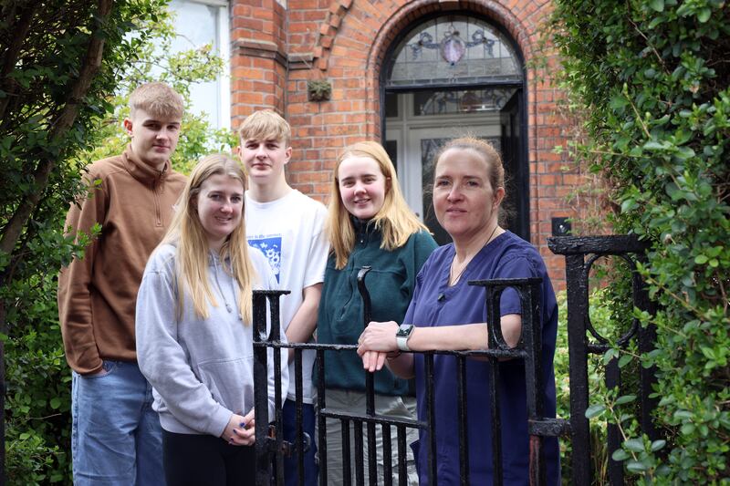 Yvonne Day with her children  James (17), Martha (21), Tommy (15) and Rosa (19) at home. Photograph: Stephan Davison/Pacemaker Press
