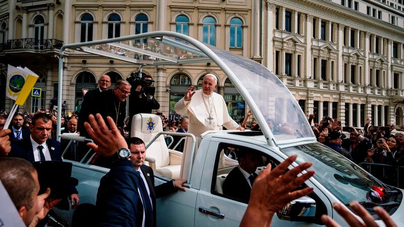 Pope Francis waves from the popemobile as he arrives to celebrate a Holy Mass on Knyaz Alexander I square in Sofia. Photograph: Getty