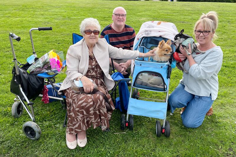 Elizabeth Hood, her son-in-law Paul Atkin and daughter Pauline Atkin, with dogs Buster and Bobo. Photograph: Freya McClements