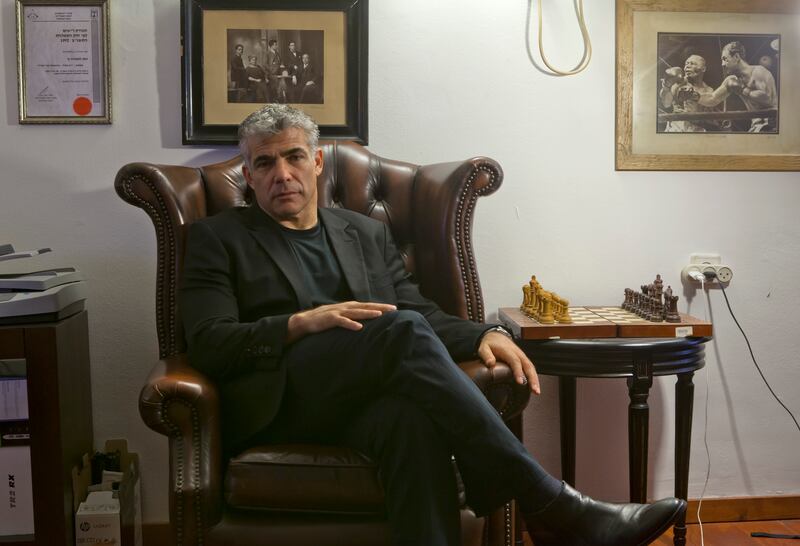Yair Lapid, Israel's then-finance minister, at home in Tel Aviv, Israel in 2013. Before his political career, Lapid was known as a popular television host, journalist, actor and songwriter. Photograph: Rina Castelnuovo/The New York Times
