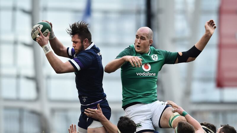Devin Toner challenges Scotland’s Hamish Watson. Photograph: Charles McQuillan/Getty