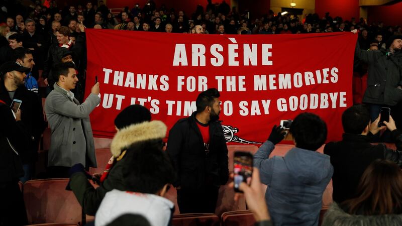 Arsenal fans hold up an anti-Wenger banner. Photo: John Sibley/Reuters