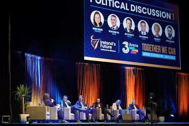 (left to right) Chair Amanda Ferguson, Neale Richmond TD, Jim O'Callaghan TD, Colum Eastwood MP, Ivana Bacik TD and Declan Kearney MLA on stage the Ireland's Future event at the 3Arena in Dublin. Photograph: Niall Carson/PA