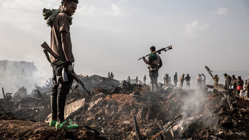 Tigray Defence Forces fighters survey the burning wreckage of an Ethiopian Air Force plane downed a few hours earlier by the rebel group south of the regional capital Mekelle on June 23rd. Photograph: Finbarr O’Reilly/New York Times