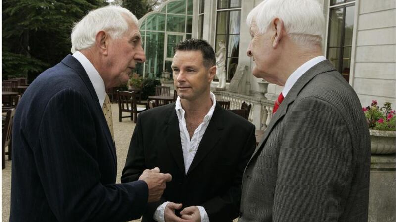 Olympic gold medallist Ronnie Delany, Fred Tiedt Jnr (whose father Fred Tiedt won silver) and Peter Byrne, President of the Association of Sports Journalists in Ireland, at an event to honour members of the Irish 1956 Melbourne Olympics team in 2006. Photograph: Dara Mac Dónaill