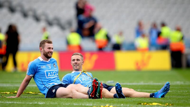 Jack McCaffrey and Paul Mannion take in the celebrations after the 2018 final win over Tyrone. Photo: Ryan Byrne/Inpho
