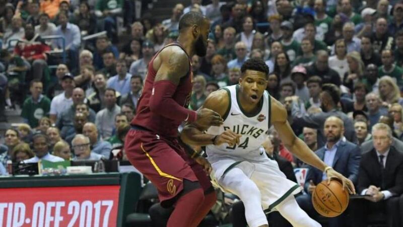 Giannis Antetokounmpo  of the Milwaukee Bucks and  LeBron James of the Cleveland Cavaliers during a game in Milwaukee in October.   Photograph: Stacy Revere/Getty Images