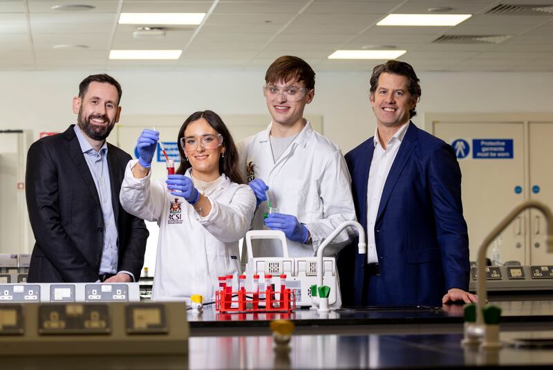On the job learning is a principal element of a new BSc ATT at RCSI. Pictured in one of its science laboratories L to R is, Dr Ben Ryan, deputy head of the School of Pharmacy and Biomolecular Sciences, students Isabella Downey and Daire Scully and Shane Ryan, general manager of Takeda Ireland