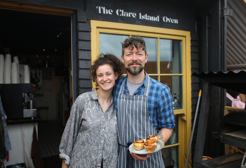 Niall McCabe and his girlfriend Alice Capponi in the the Clare Island Oven a cafe they operate together from a converted shipping container beside the harbour on Clare Island. Photograph: Bryan O' Brien 