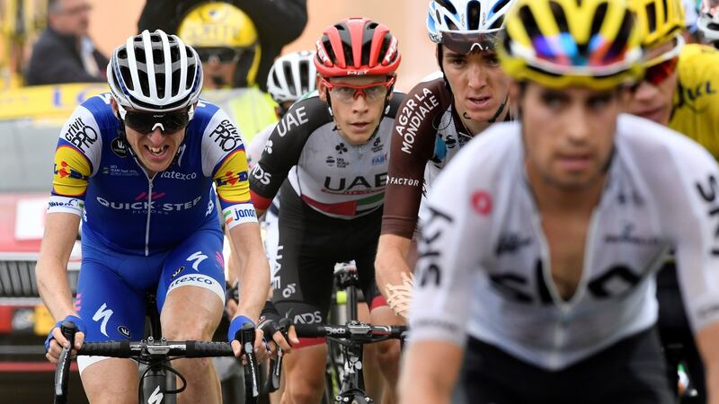 Martin looks to make a move towards the end. Photo: Bernard Papon/Reuters