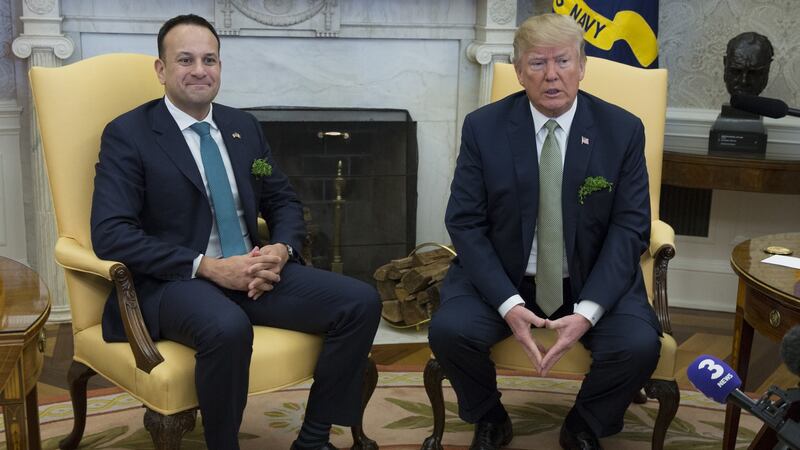 Leo Varadkar and Donald Trump “manspreading” at the White House. Photograph:  Chris Kleponis-Pool/Getty Images