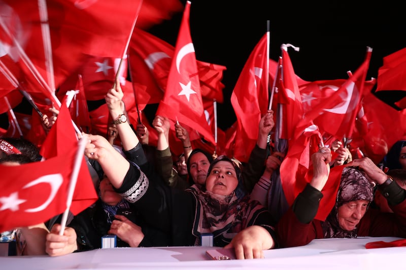 Supporters of  Recep Tayyip Erdogan at the presidential palace in Ankara. Photograph: Ali Unal/AP
