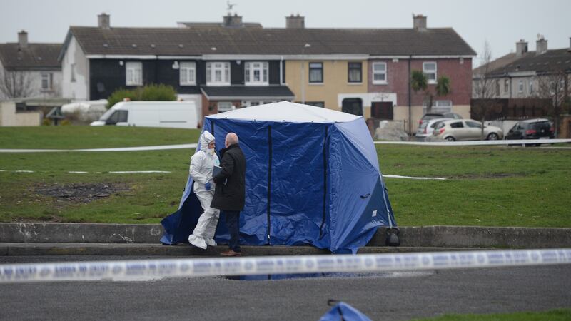 A cover has been placed over the human remains found in Coolock  on Monday night. Photograph: Dara Mac Dónaill/The Irish Times
