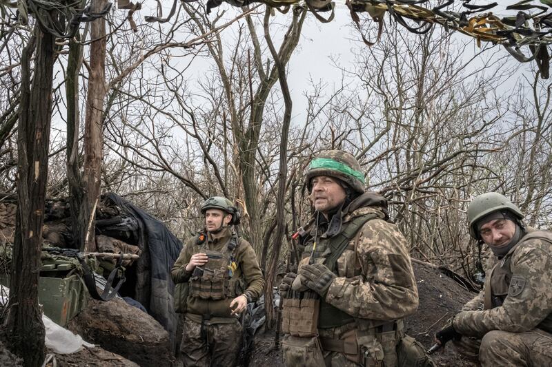 Ukrainian soldiers scan the horizon for Russian troops in southern Bakhmut, in the Donetsk region in eastern Ukraine. Photograph: Mauricio Lima/The New York Times