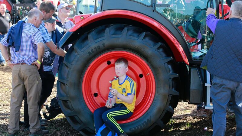 Luke Whyte (10) from Roscommon takes a break on day one of the National Ploughing Championships. Photograph: Nick Bradshaw for The Irish Times