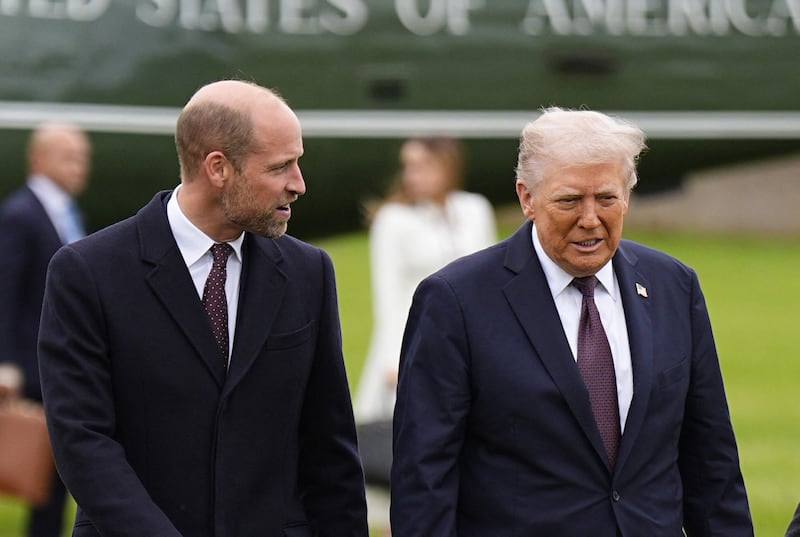 US president Donald Trump speaks with Britain's Prince William upon arrival at the grounds of Windsor Castle on Wednesday. Photograph by Aaron Chown/Pool/AFP via Getty Images          