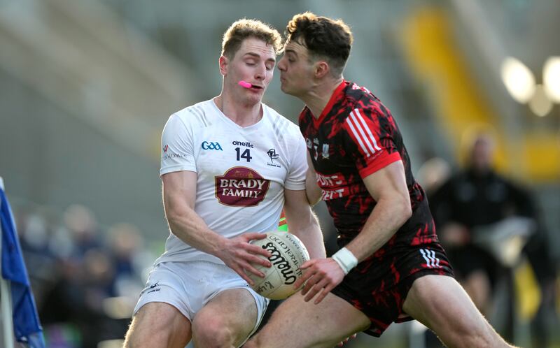 Daniel Flynn of Kildare and Daniel O’Mahoney of Cork during the weekend's game. PhotographJames Lawlor