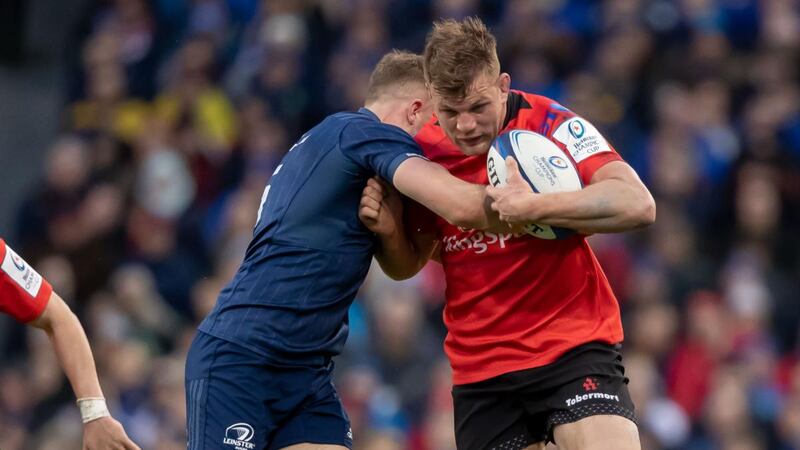 Leinster’s Jordan Larmour tackes his former club mate, Ulster’s Jordi Murphy at the Aviva Stadium. Photograph: Morgan Treacy/Inpho
