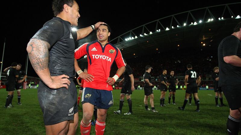 Munster’s Lifeimi Mafi with New Zealand’s Anthony Tuitavake after the final whistle of the 2008 meeting between the sides at Thomond Park. Photograph: Julien Behal/PA Wire
