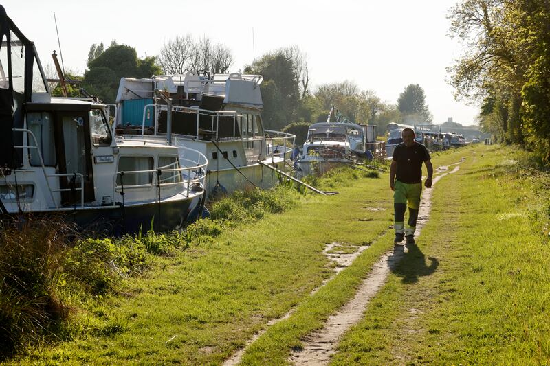 Colm Meyler from the boat Carrigeen, one of the approx 16 flotilla boats on the Royal Canal which were heading to Dublin for the Dublin Boat Rally but have were stopped at Confey, near Leixlip on Wednesday. The boaters were told Irish Rail will not be able to lift the Newcomen Bridge (between the Conventions Centre Dublin and Croke Park) , to enable the flotilla to enter the city centre, the Liffey, Grand Canal Dock and back to the Shannon via the Grand Canal. The route around the Royal and Grand Canals via the Liffey is know as the Green and Silver. Photograph: Alan Betson