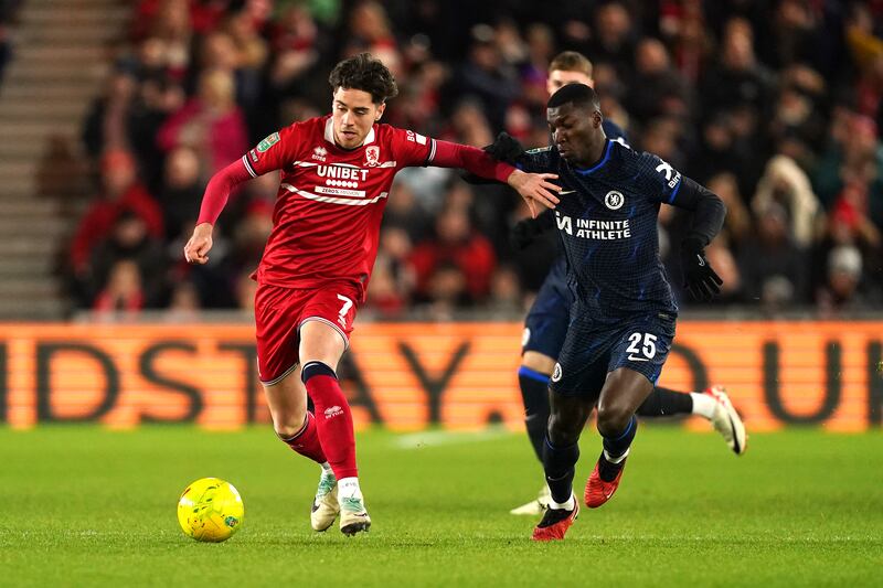 Middlesbrough's Hayden Hackney (left) and Chelsea's Moises Caicedo battle for the ball during the Carabao Cup semi-final on Tuesday. Photograph: Martin Rickett/PA Wire