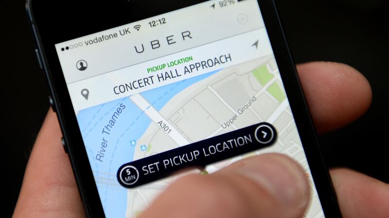 The Uber app. Photograph: Andrew Matthews/PA Wire