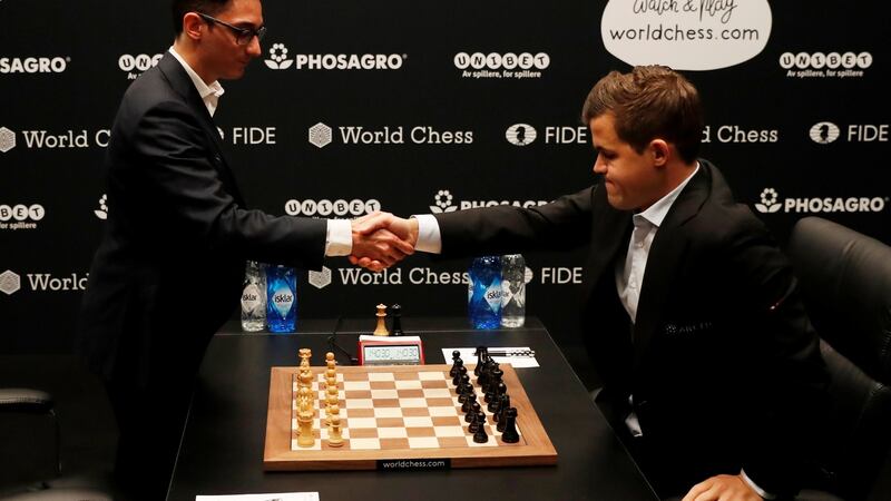Magnus Carlsen and Fabiano Caruana before the first game. Photograph: Paul Childs/Reuters