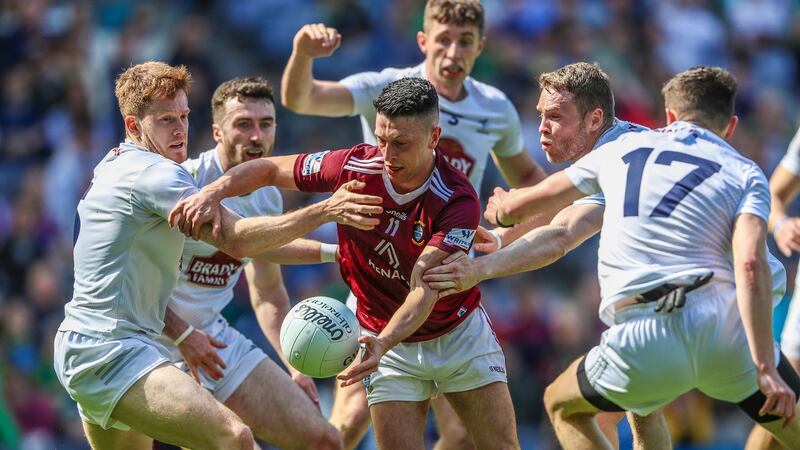 Westmeath’s Ronan O’Toole finds himself surrounded by Kildare players at Croke Park. Photograph: Evan Treacy/Inpho