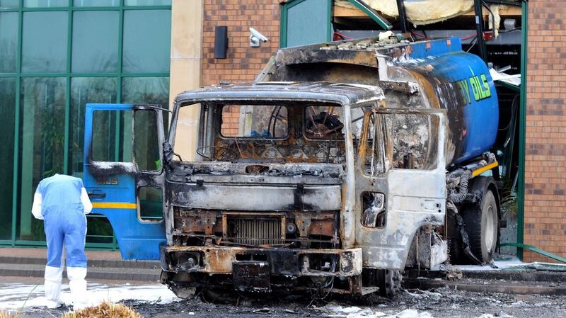 The burnt out oil tanker at the offices of the Aventas group, Ballyconnell, formerly Quinns, in December 2013. Photograph: Pacemaker