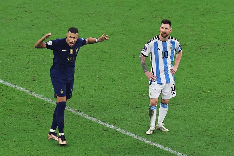 Kylian Mbappé beside an unimpressed Lionel Messi after scoring France's third goal. Photograph: Buda Mendes/Getty Images