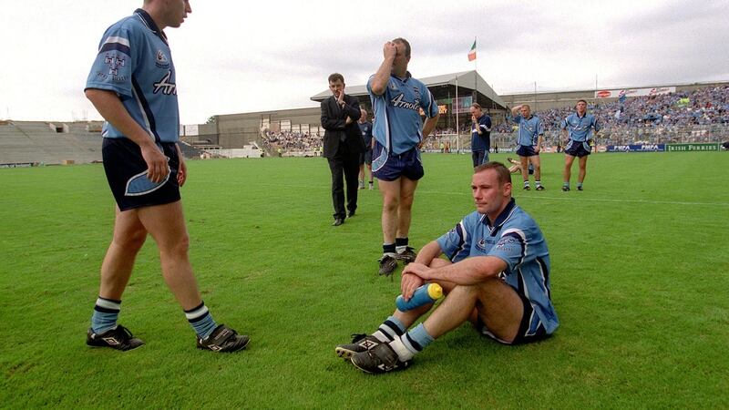 Dublin’s Paul Curran sits dejected following defeat to Kildare in the Leinster football championship final of 2000. Photograph: Billy Stickland/Inpho