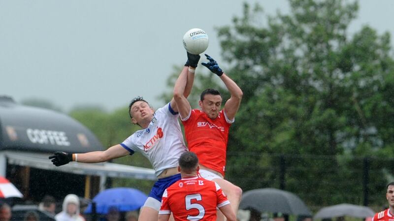 Louth’s Tommy Durnin and Gary Mohan of Monaghan. Photograph: Ciaran Culligan/Inpho