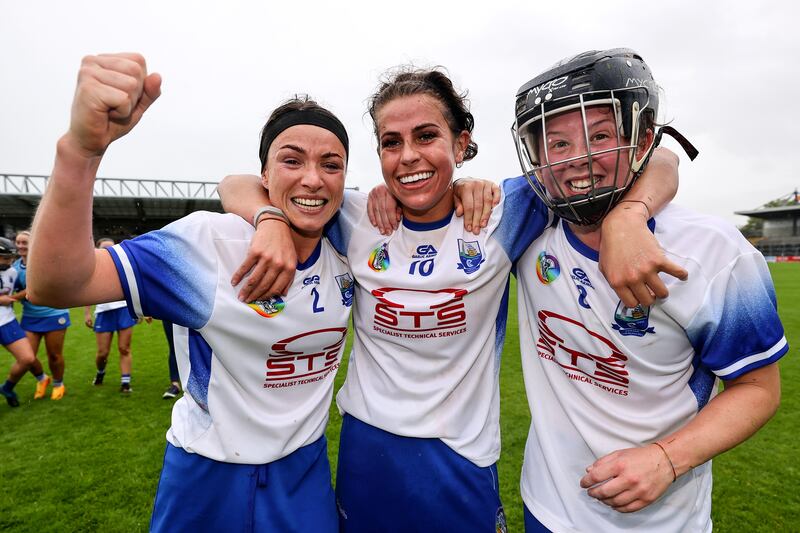 Waterford's Vikki Faulkner, Niamh Rockett and Orla Hickey celebrate after the final whistle. Photograph: Ben Brady/Inpho