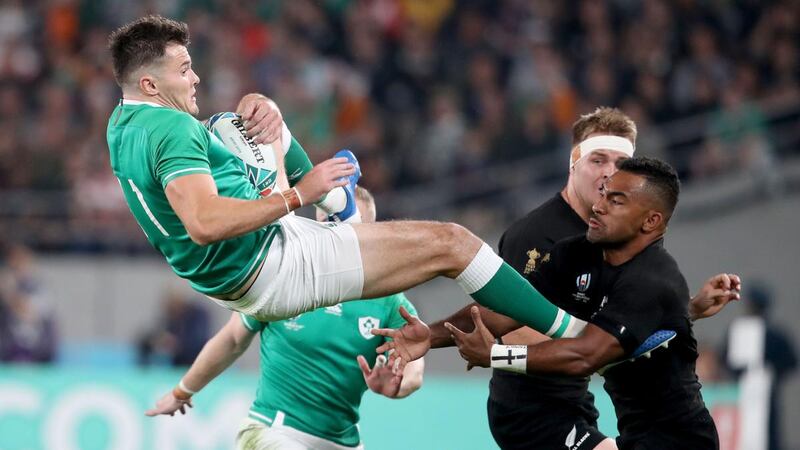 Ireland’s Jacob Stockdale catches the ball ahead of New Zealand’s Sevu Reece during the Rugby World Cup quarter-final in Tokyo last September. Photograph: Dan Sheridan/Inpho