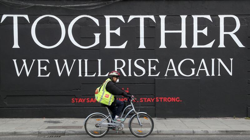 A cyclist wearing a face mask pictured in Dublin. Photograph: Brian Lawless/PA