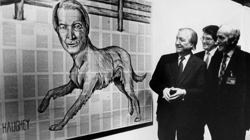 The late former taoiseach Charlie Haughey studies a portrait of himself by Tim Rollins at the ROSC exhibition of 1988. Photograph: Jack McManus
