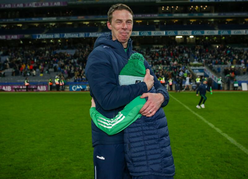 O'Loughlin Gaels manager Brian Hogan celebrates with his son Jack after winning the Leinster Senior Club Hurling Championship. Photograph: Ken Sutton/Inpho