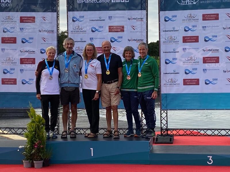 Breda and Mick Keating (right) win bronze medals at the 2023 ICF Masters Canoe Marathon World Championships in Vejen, Denmark, in September.