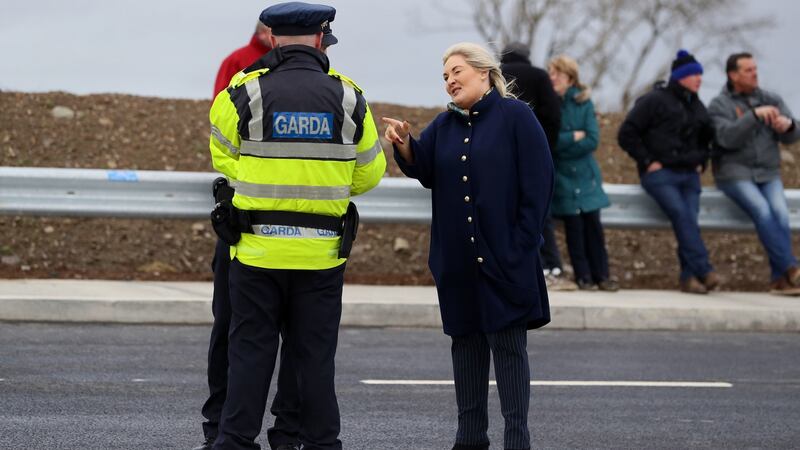 Former Fine Gael candidate and now Independent Verona Murphy speaks with members of An Garda Síochána as she attends the opening of Ireland’s longest bridge, in New Ross. Photograph: Brian Lawless/PA Wire