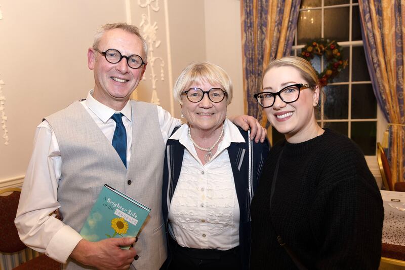 Alan McBride with Dorothy Cairns and Zoe McBride at the launch of A Brighter Side of the Troubles. Photograph: Kevin Cooper/Photoline 