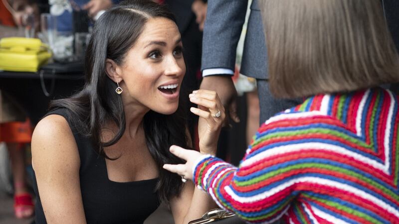 Meghan, duchess of Sussex, with Sinéad Burke at a reception in Dublin. Photograph: Geoff Pugh/Pool/Getty