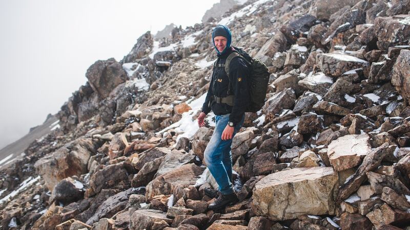 Henk van der Klok on  a hike through Nelson Lakes National Park in New Zealand