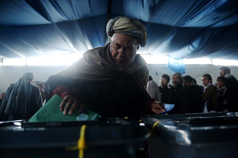 April 5th, 2014: An Afghan man casts his vote at a local polling station in Kabul. Photograph: Shah Marai/AFP