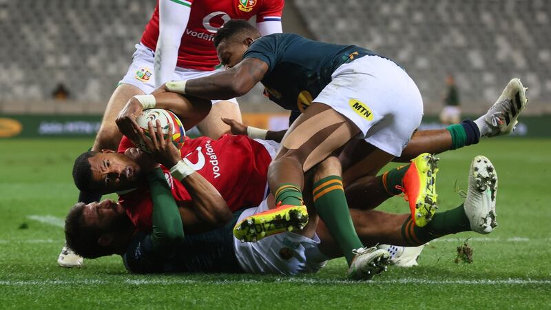 South Africa A duo  Willie le Roux and Sbu Nkosi tackle Anthony Watson of the Lions during the game in Cape Town. Photograph: Billy Stickland/Inpho