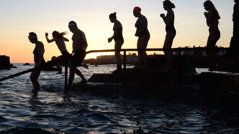 Enjoying a Christmas swim at the forty foot, Sandycove, Co Dublin on Christmas morning. Photograph: Dara Mac Dónaill / The Irish Times