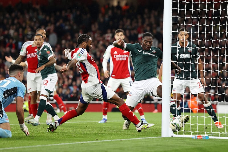 Arsenal's Raheem Sterling scores against Bolton at Emirates Stadium. Photograph: Ryan Pierse/Getty Images