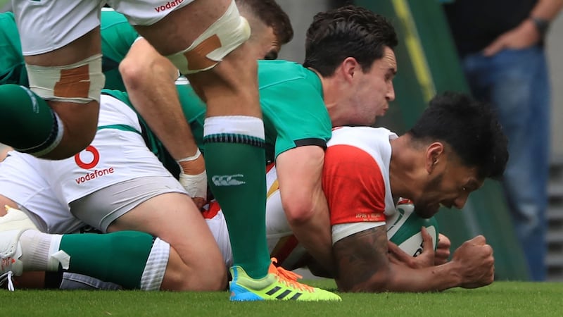 Timothy Lafaele scores a try. Photo: Donall Farmer/AFP via Getty Images